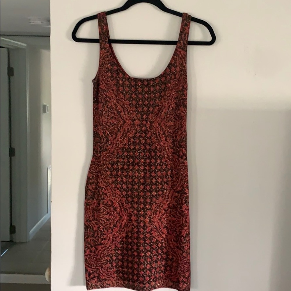 Red and black body con dress with slight shimmer